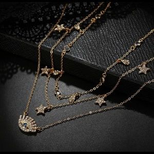 Multilayer Gold Star/Crystal/Evil Eye Chocker